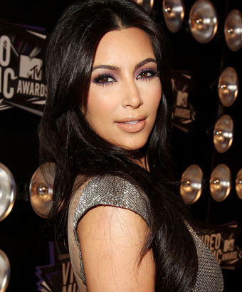 Kim Kardashian's Glossy Center-Parted Long Hair