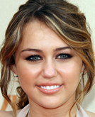 Miley Cyrus Long Curly Hairstyle with Low Ponytail at 2009 MTV Movie Awards